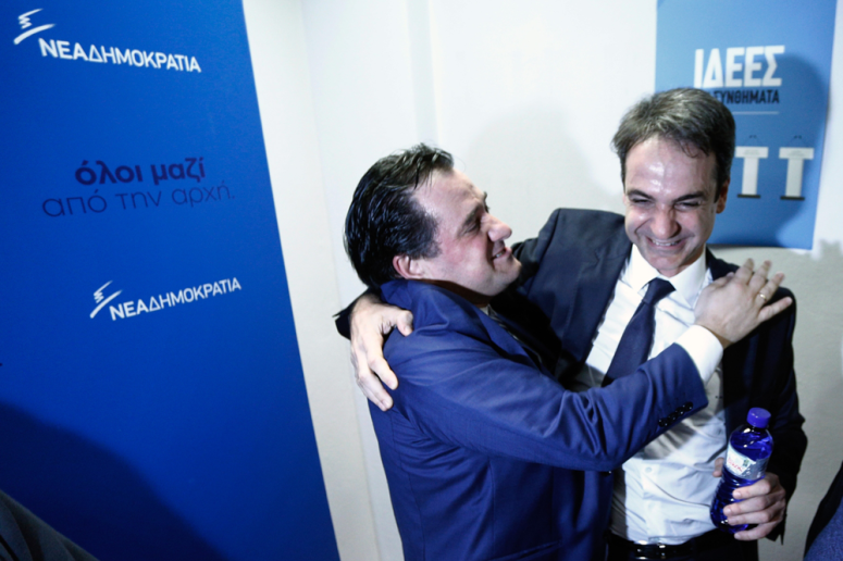 Kyriakos Mitsotakis (right) embraces Adonis Georgiadis in celebration, after his election as leader of New Democracy. Photo: Alexandros Michailidis / SOOC